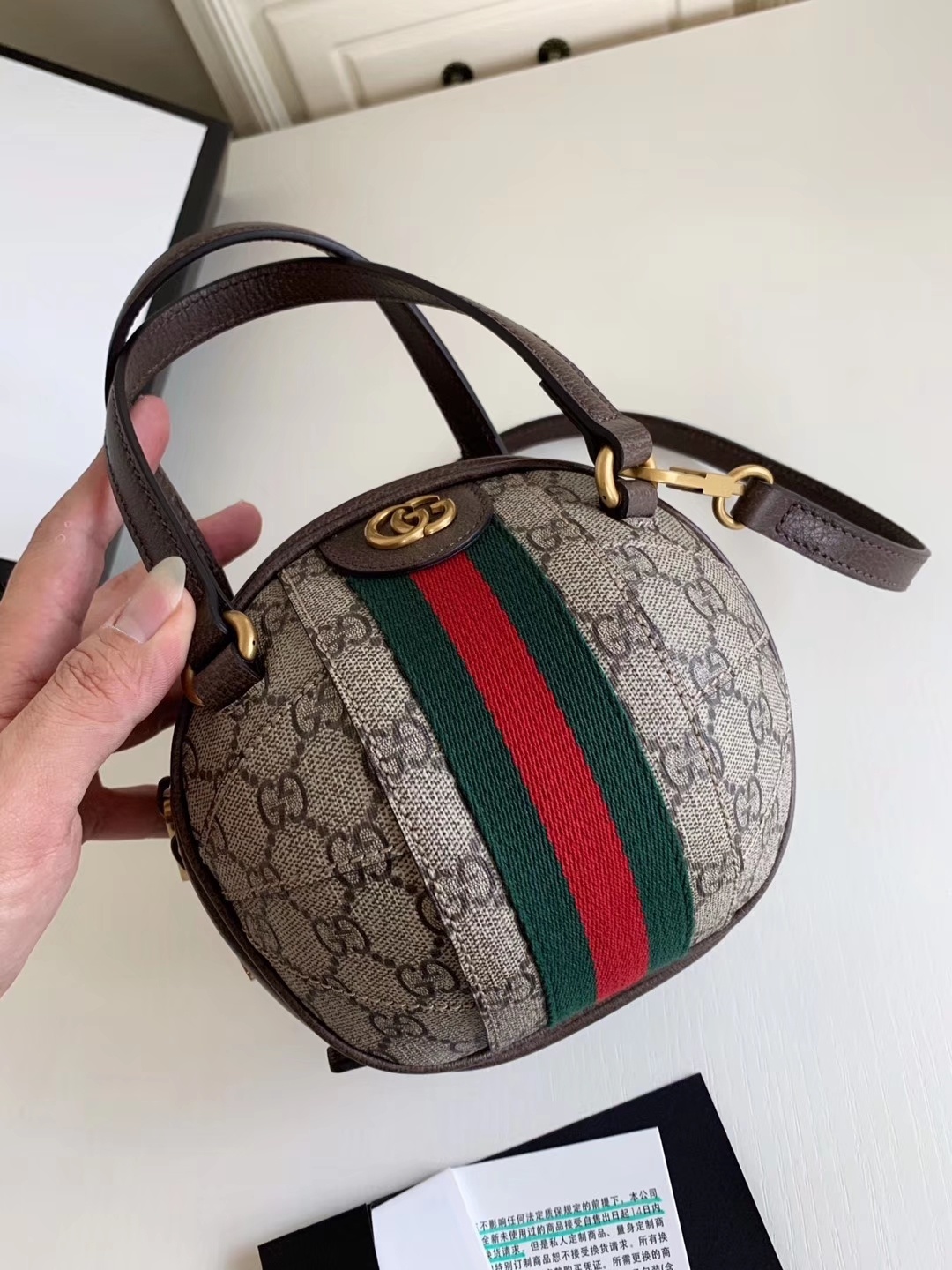G*u*i ophidia handbags