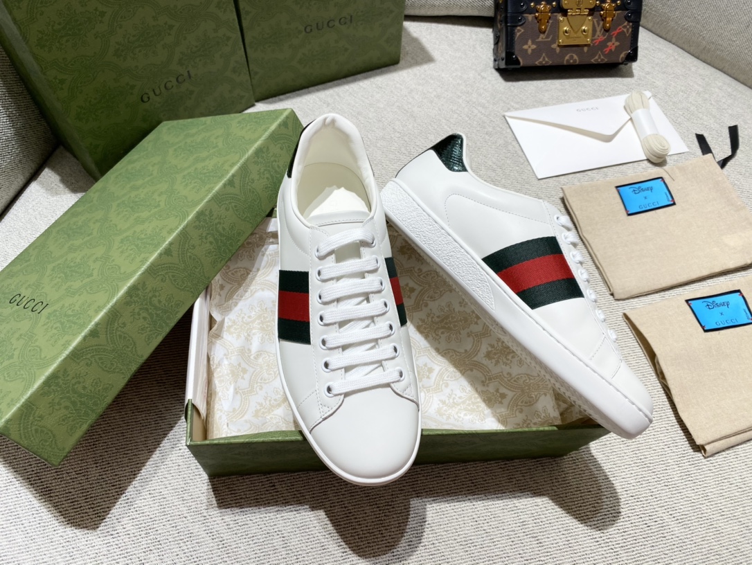 G*u*i sneakers