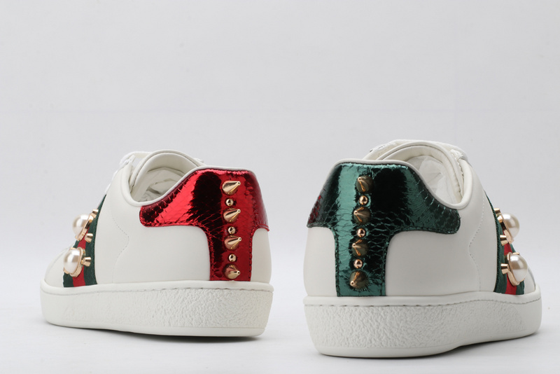 G*u*i sneakers