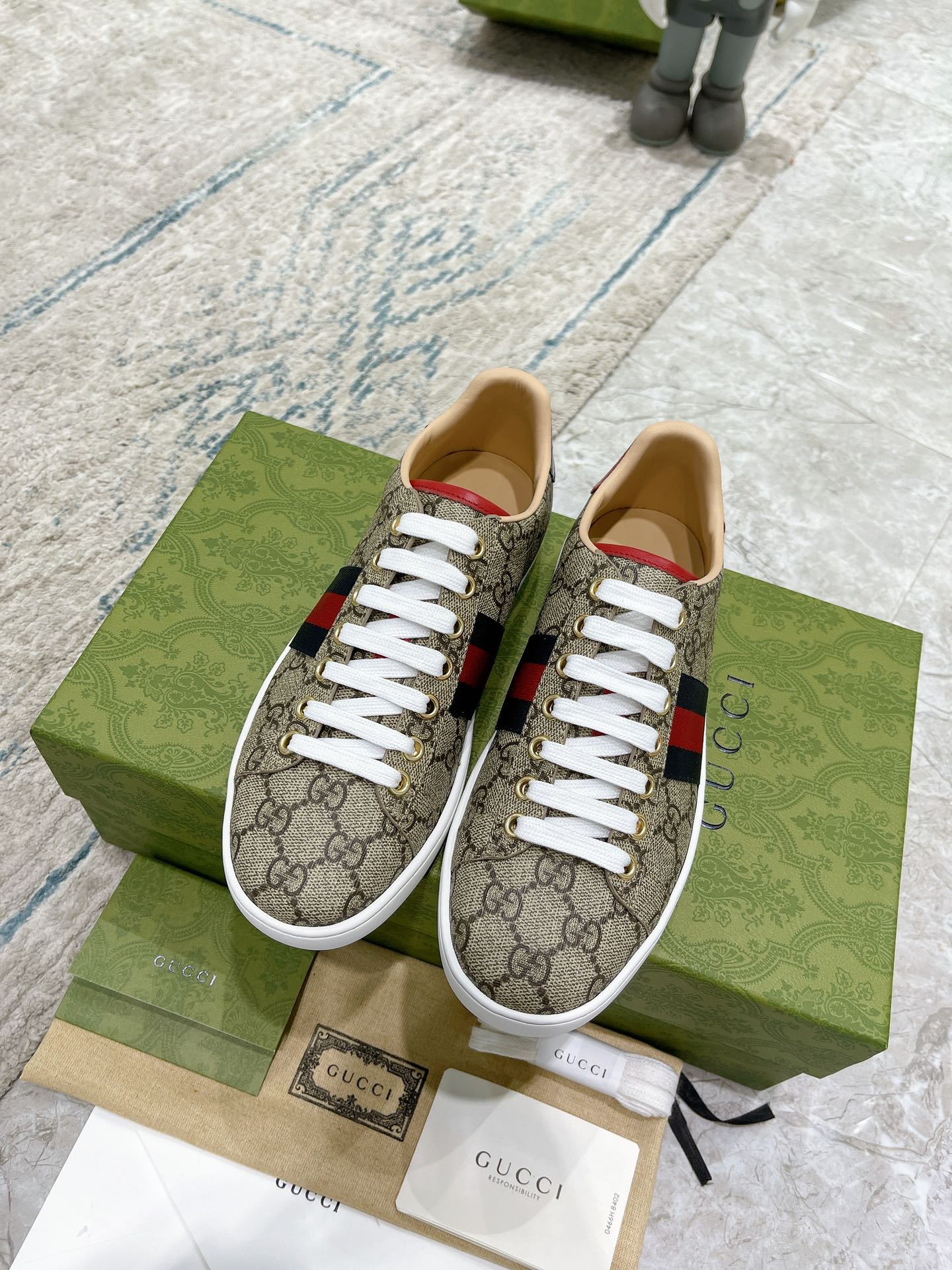 G*u*i sneakers