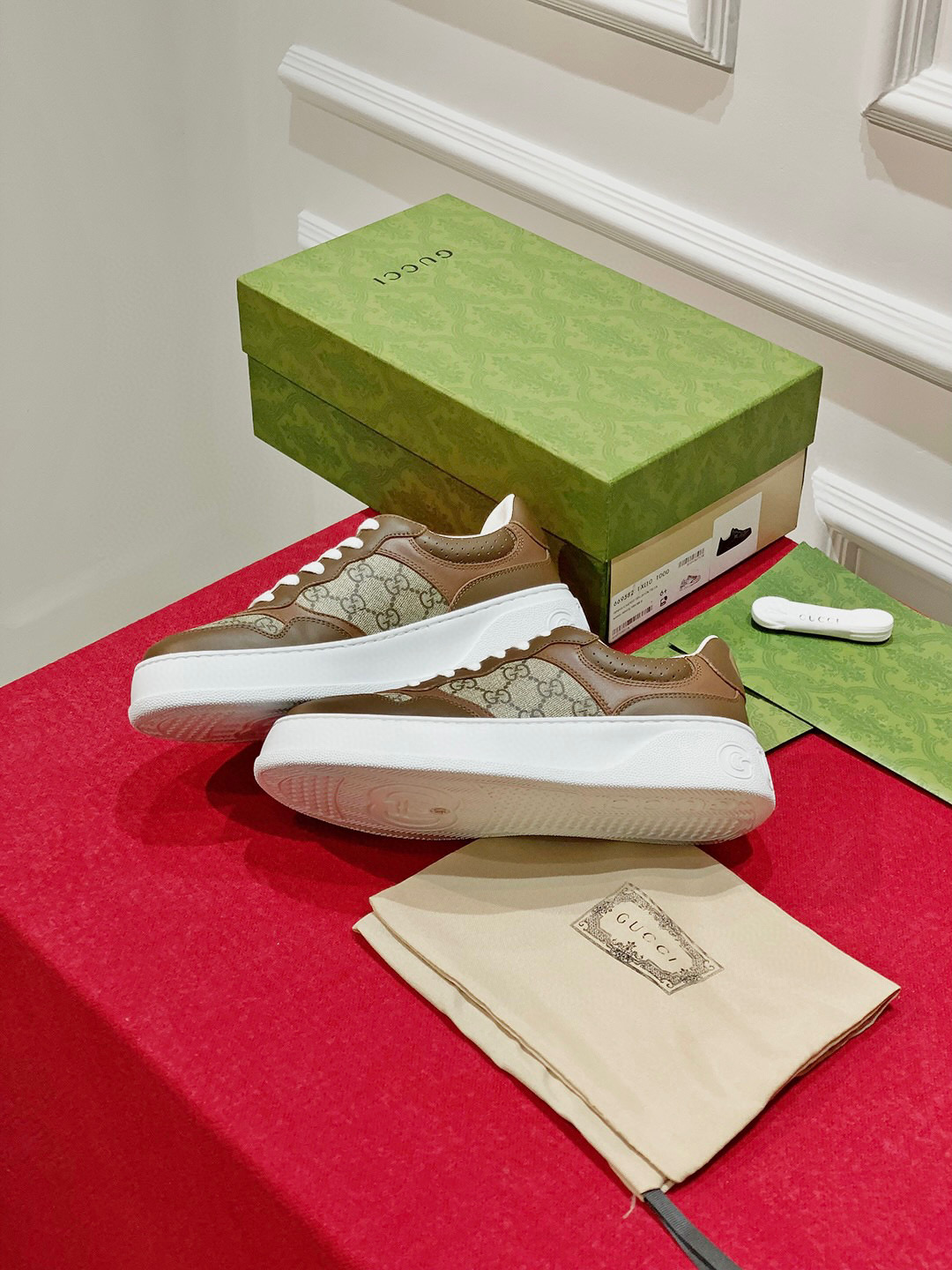 G*u*i sneakers