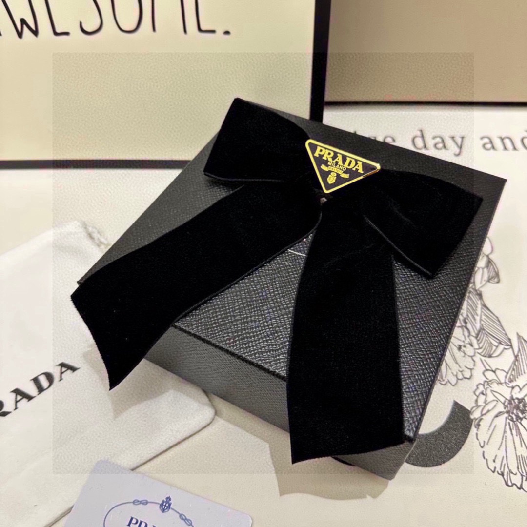 Prada Triangle-Logo Bow Velvet Hair Clip | Black