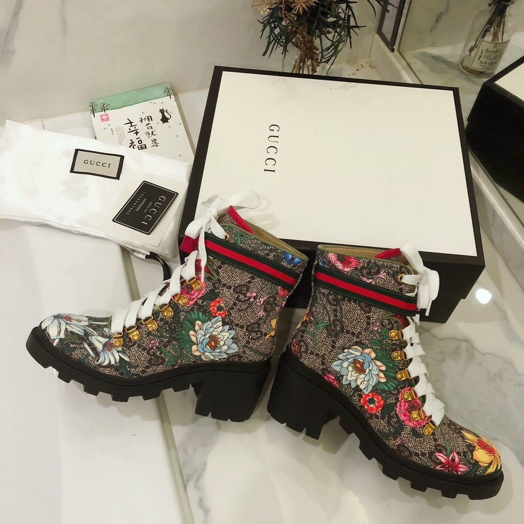 G*u*i boots