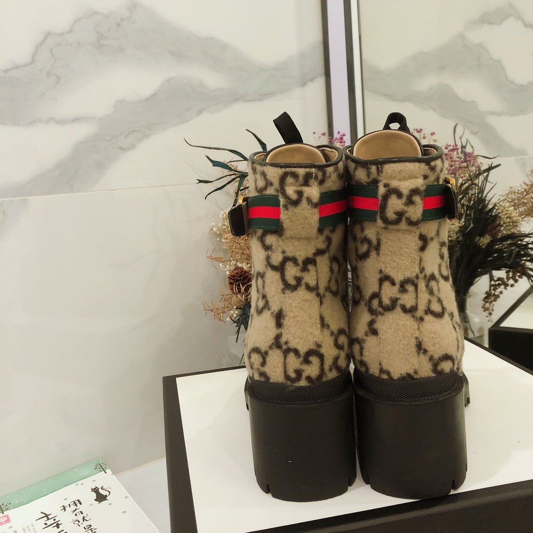 G*u*i boots