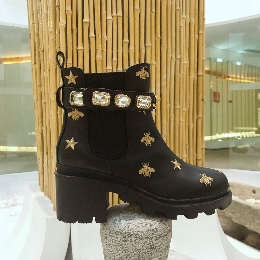 G*u*i boots