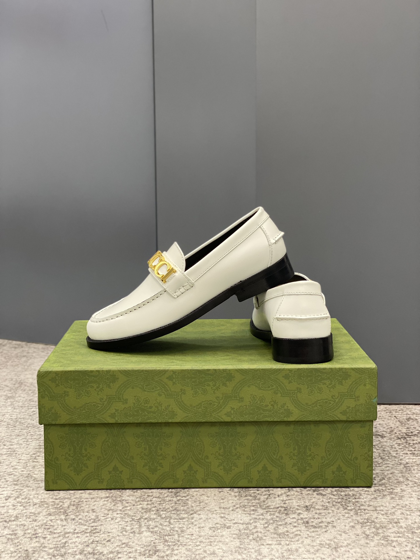 G*u*i loafers