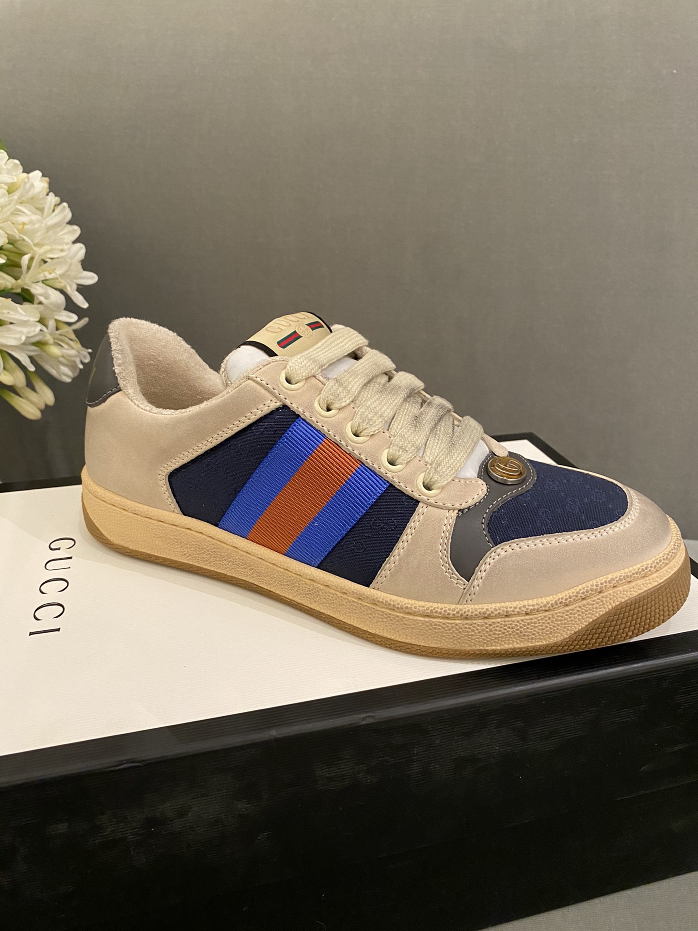 G*u*i sneakers