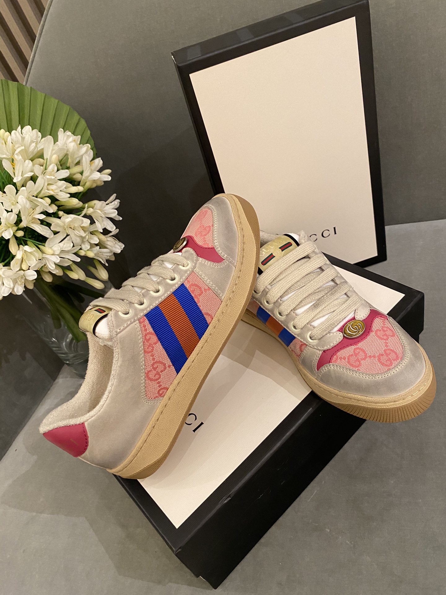 G*u*i sneakers
