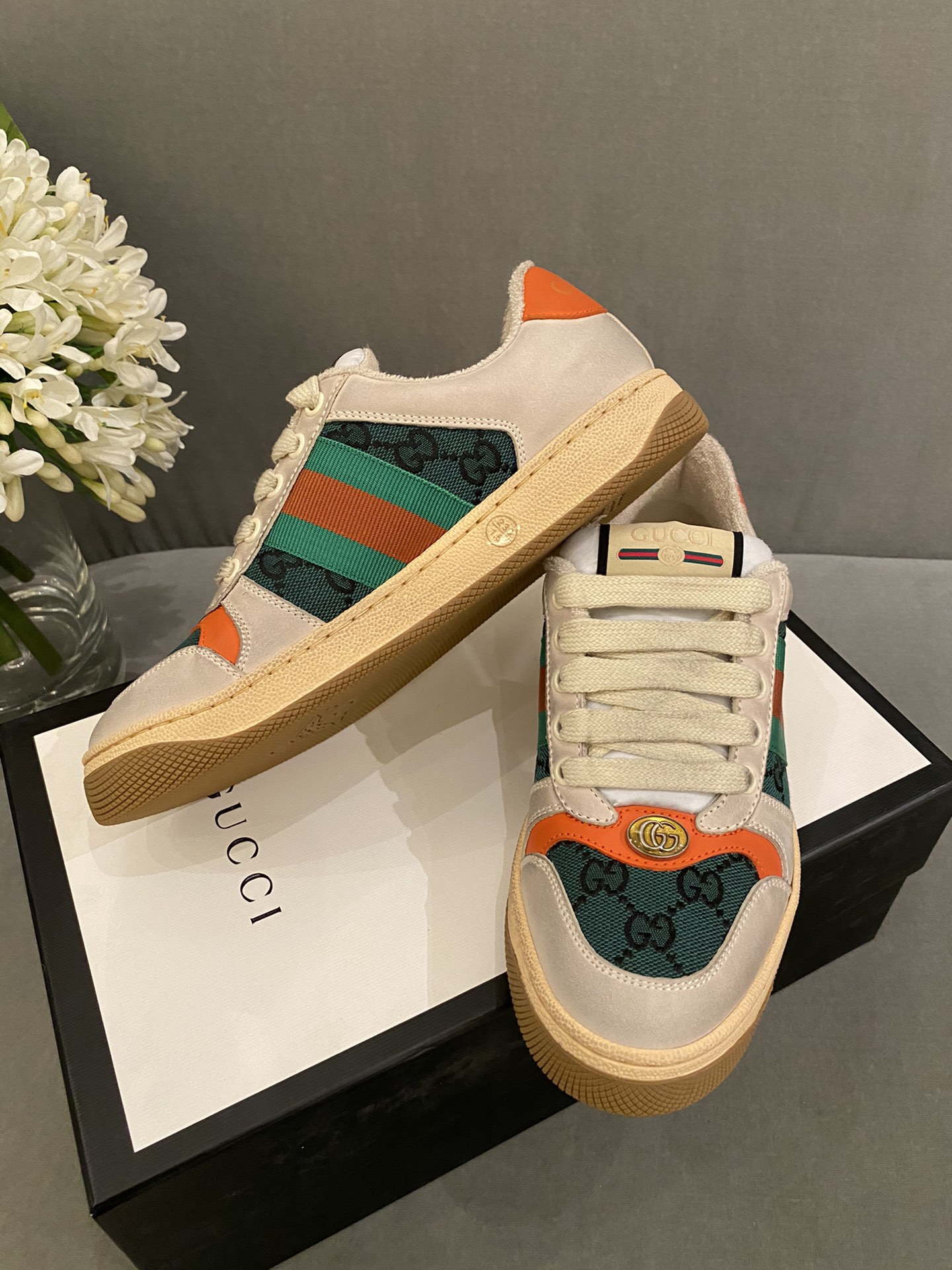 G*u*i sneakers