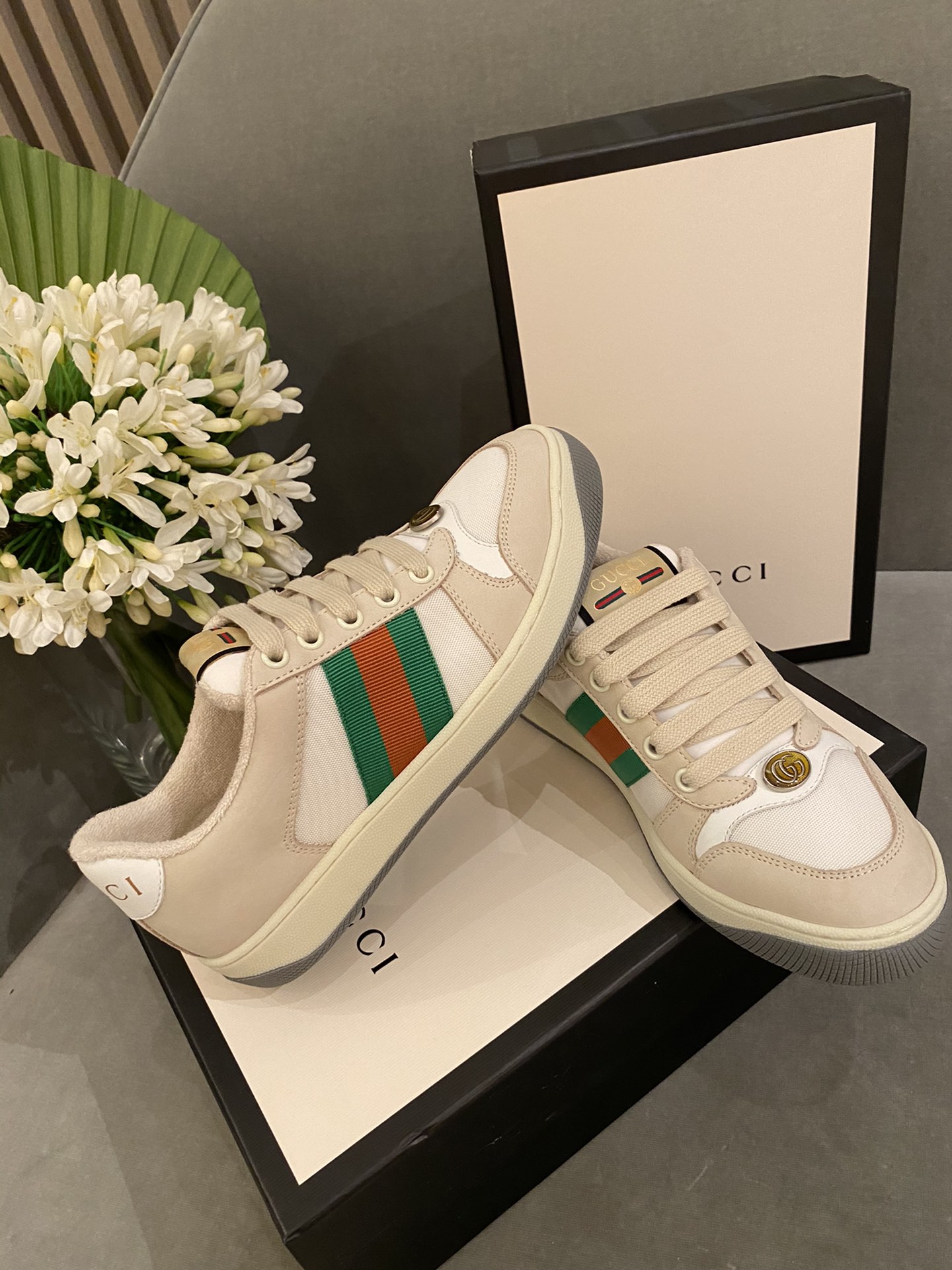 G*u*i sneakers