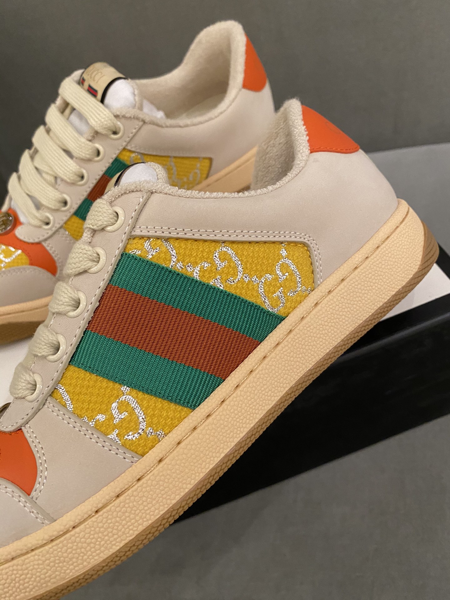 G*u*i sneakers