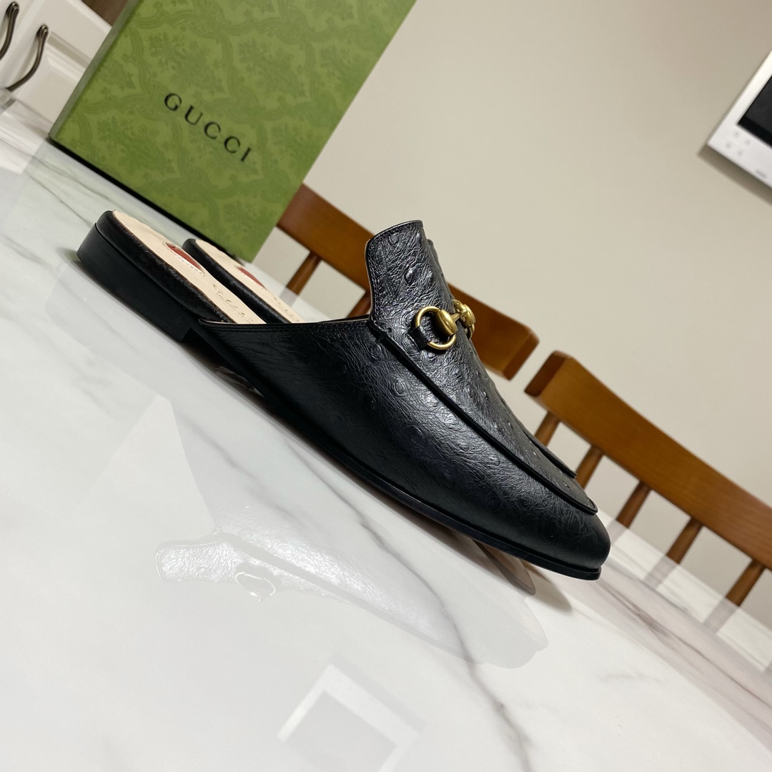 G*u*i loafers
