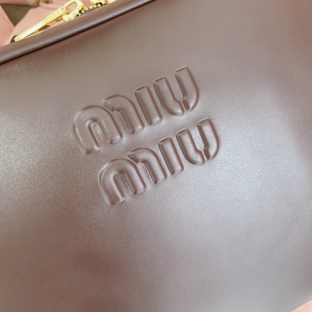 M*um*u leather top handbag-34x23x12cm