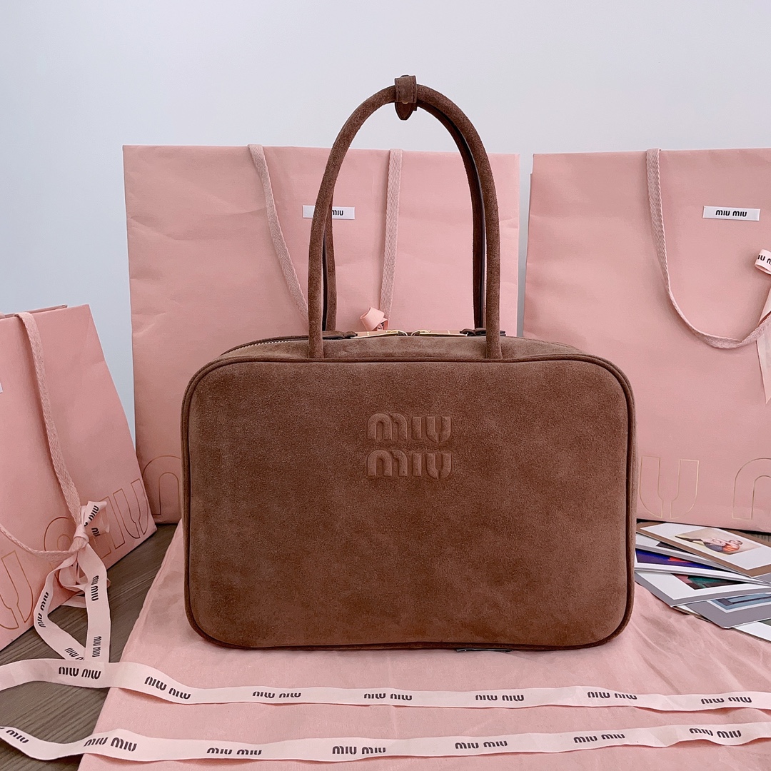 M*um*u leather top handbag-34x23x12cm
