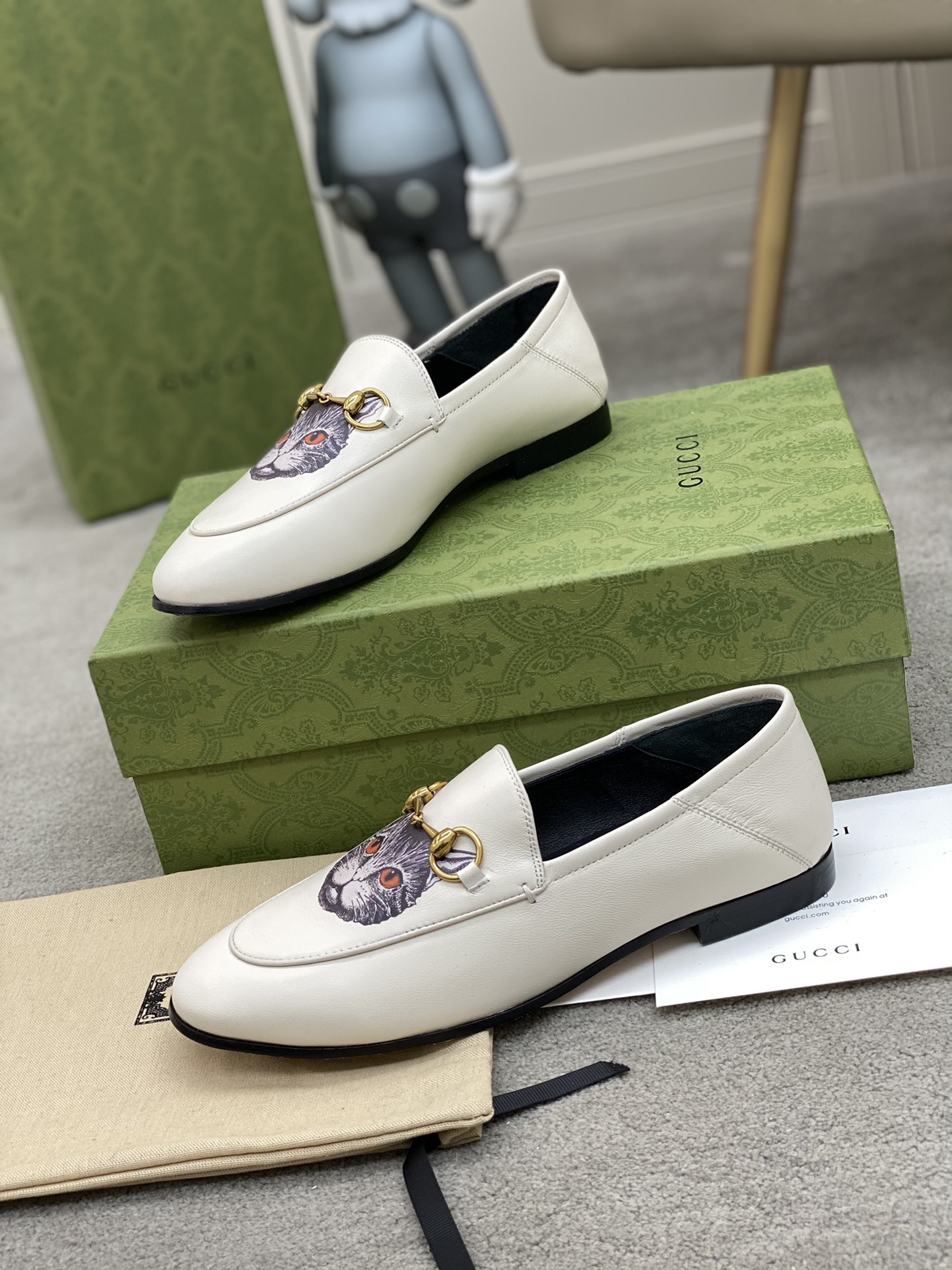 G*u*i loafers