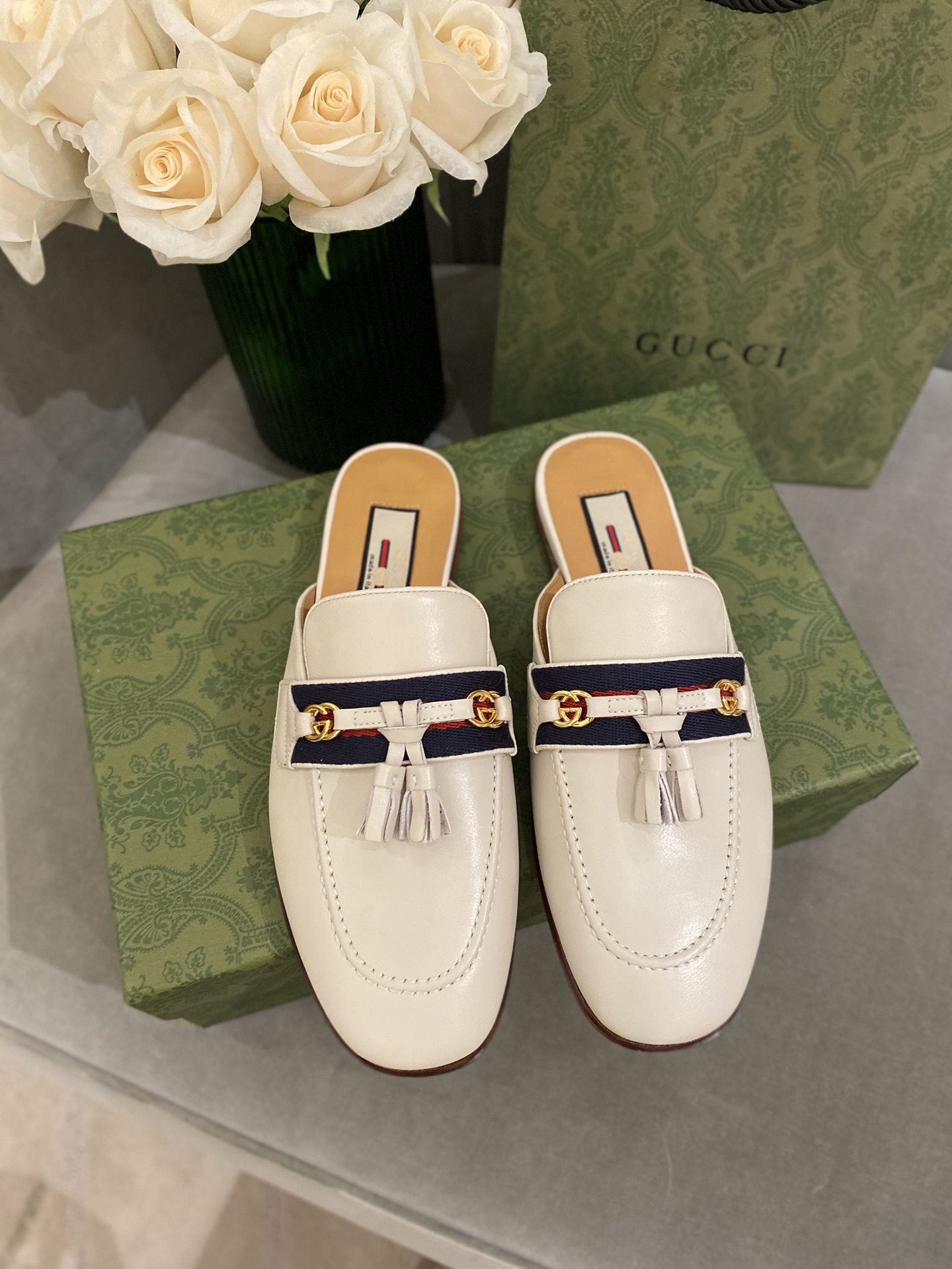 G*u*i loafers